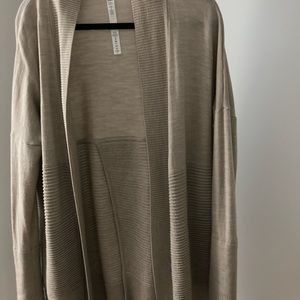 100% merino wool cardigan.